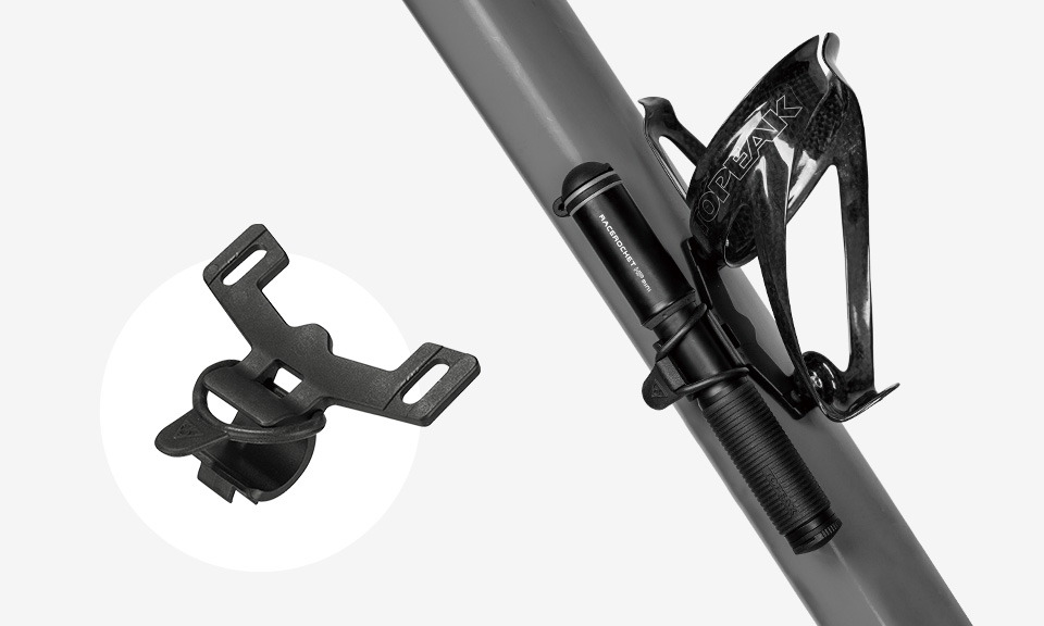 Topeak RaceRocket HP Mini Minipumpe in Schwarz/Gold montiert am Fahrradrahmen neben Flaschenhalter.